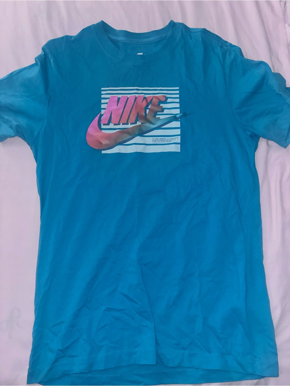 Nike Turquoise Graphic Logo Tee with Pink-Orange Accent